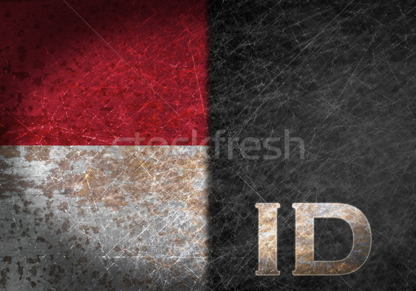 Stock photo: Old rusty metal sign with a flag and country abbreviation
