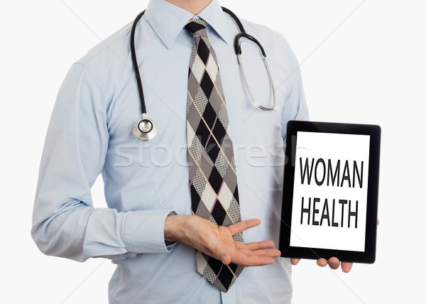 Doctor holding tablet - Woman health Stock photo © michaklootwijk