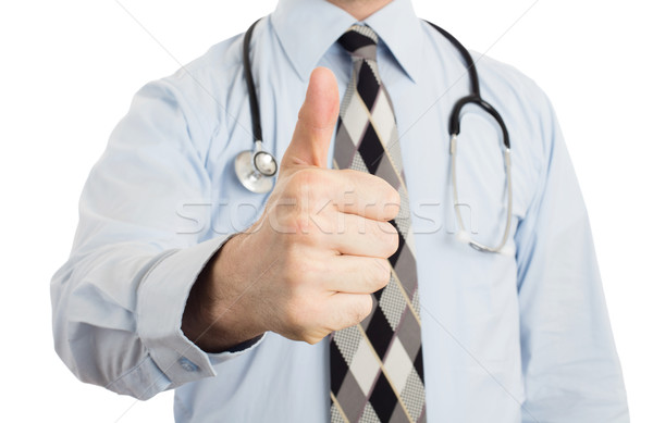 Male doctor showing thumbs up Stock photo © michaklootwijk