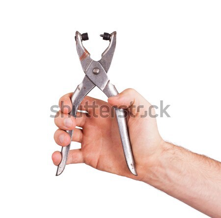 Male with a sharp knife in it's hand with a handcuff Stock photo © michaklootwijk