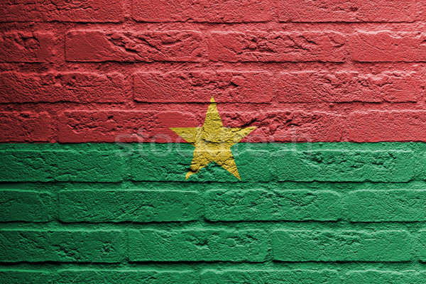 Brick wall with a painting of a flag, Burkina Faso Stock photo © michaklootwijk