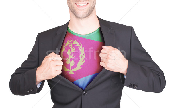 Businessman opening suit to reveal shirt with flag Stock photo © michaklootwijk