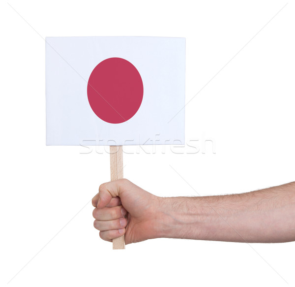 Hand holding small card - Flag of Japan Stock photo © michaklootwijk