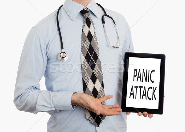Orvos tart tabletta pánik támadás izolált Stock fotó © michaklootwijk