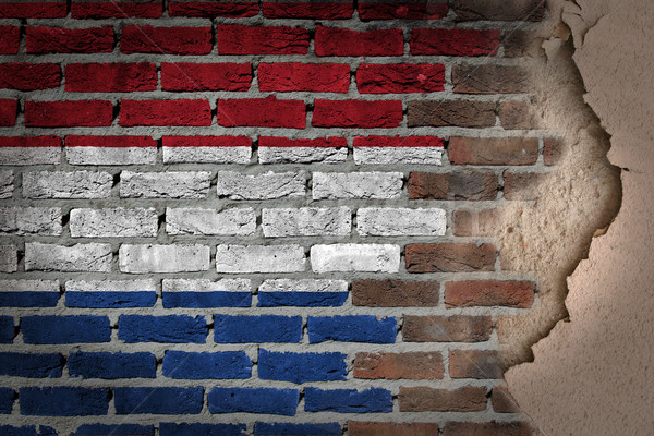 Dark brick wall with plaster - Netherlands Stock photo © michaklootwijk
