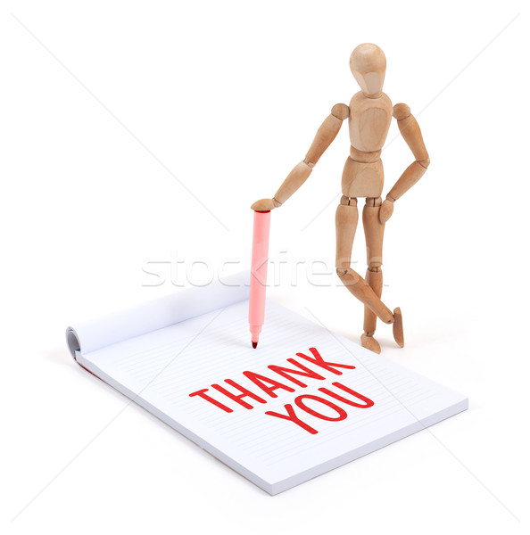 Wooden mannequin writing - Thank you Stock photo © michaklootwijk