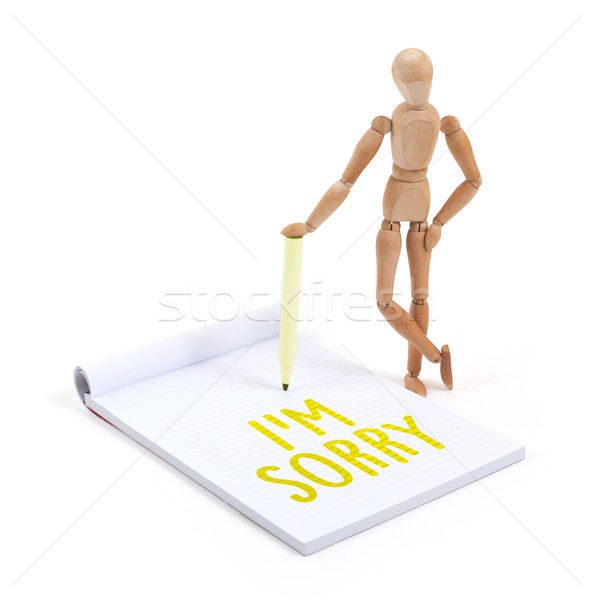 Wooden mannequin writing - I'm sorry Stock photo © michaklootwijk