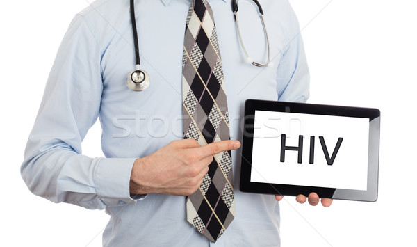 Orvos tart tabletta hiv izolált fehér Stock fotó © michaklootwijk