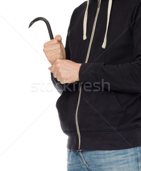 Crime concept. Criminal in hood with crowbar in hand Stock photo © michaklootwijk