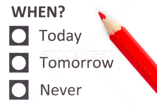 Red pencil choosing (deadline) Stock photo © michaklootwijk