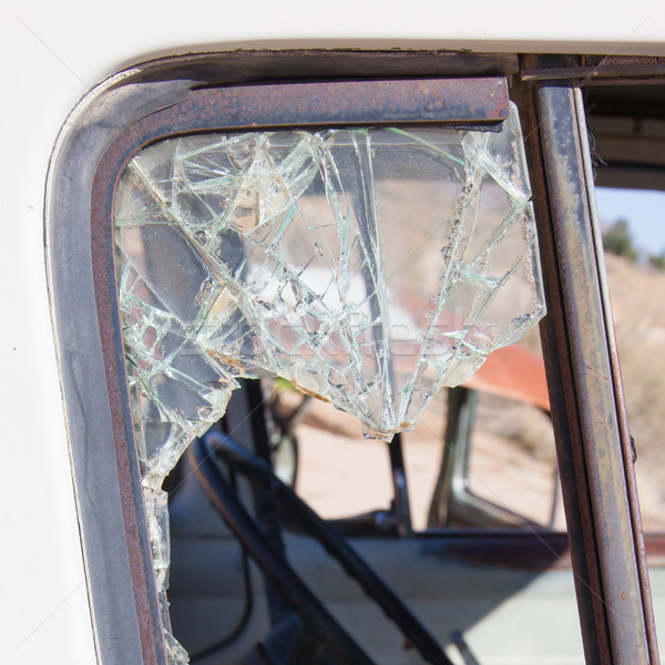 Stock photo: Old dirty car with busted window