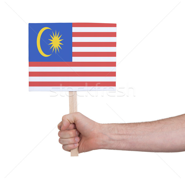Hand holding small card - Flag of Malaysia Stock photo © michaklootwijk