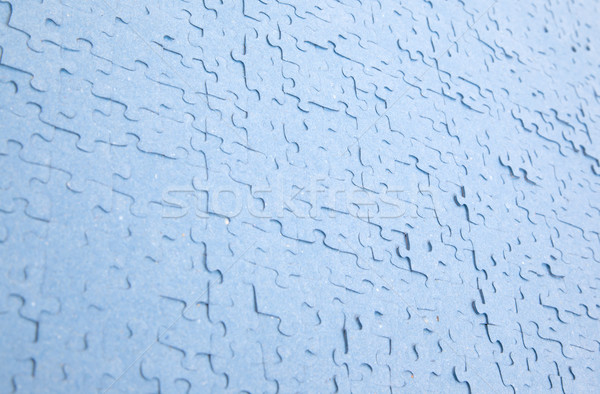 Connected blue puzzle pieces isolated Stock photo © michaklootwijk
