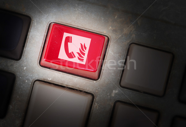 Czerwony przycisk brudne starych płyta selektywne focus Zdjęcia stock © michaklootwijk