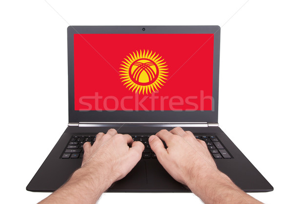 Eller çalışma dizüstü bilgisayar Kırgızistan ekran Stok fotoğraf © michaklootwijk
