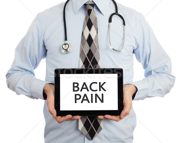 Doctor holding tablet - Back pain Stock photo © michaklootwijk