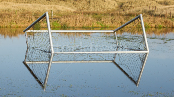 Football goal in a flooded field Stock photo © michaklootwijk