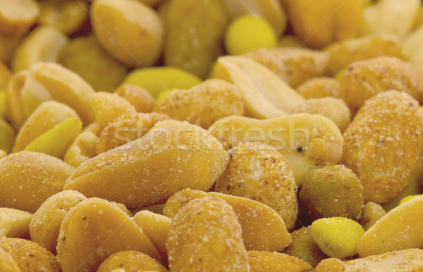 Fresh mixed salted nuts for backgrounds Stock photo © michaklootwijk