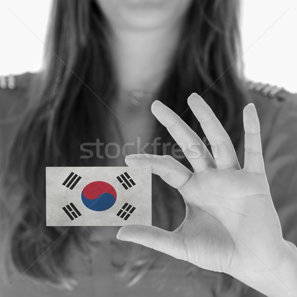 Vrouw tonen visitekaartje zwart wit Zuid-Korea pak Stockfoto © michaklootwijk