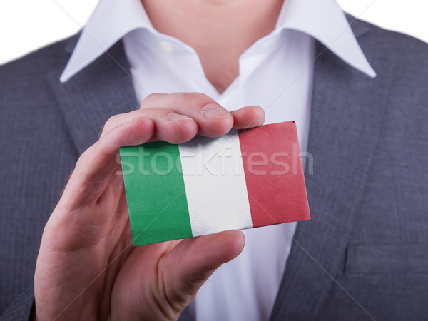 Stock photo: Businessman showing card, matte paper effect