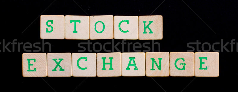 Letters on wooden blocks (stock, exchange) Stock photo © michaklootwijk