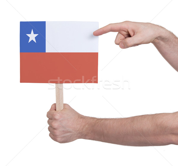 Hand holding small card - Flag of Chile Stock photo © michaklootwijk
