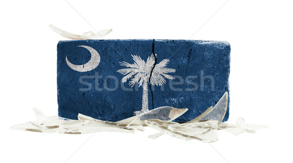 Baksteen gebroken glas geweld vlag South Carolina muur Stockfoto © michaklootwijk