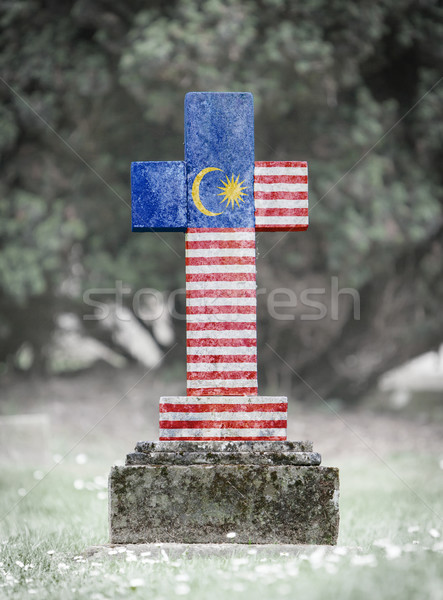 Grafsteen begraafplaats Maleisië oude verweerde vlag Stockfoto © michaklootwijk
