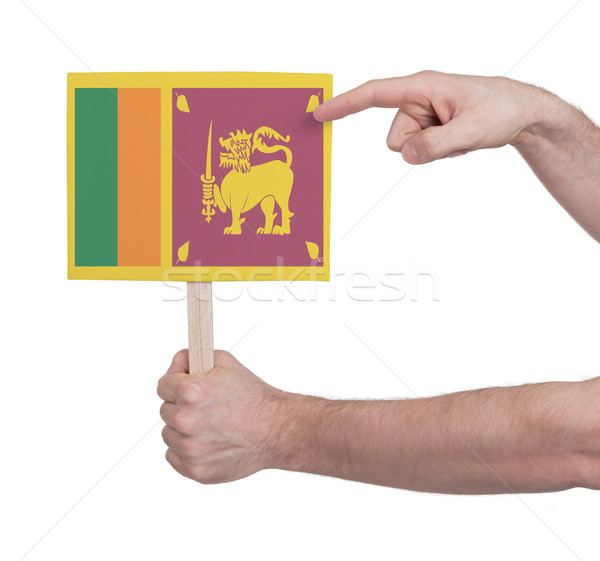 Hand holding small card - Flag of Sri Lanka Stock photo © michaklootwijk