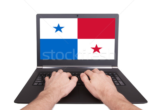 Kezek dolgozik laptop Panama mutat képernyő Stock fotó © michaklootwijk