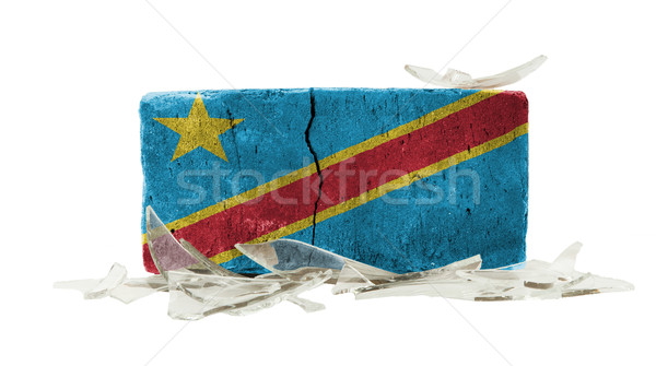 Baksteen gebroken glas geweld vlag Congo muur Stockfoto © michaklootwijk
