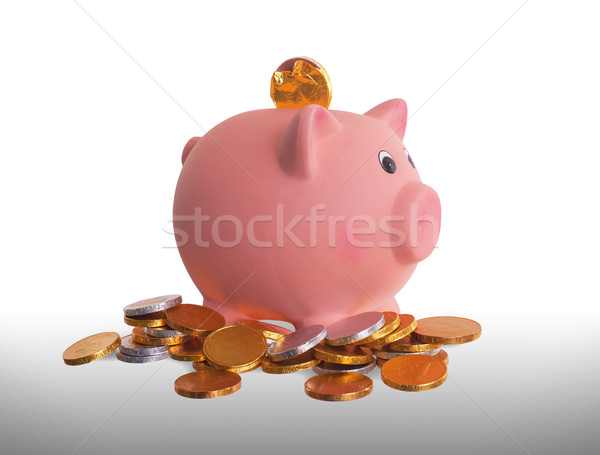 Euro currency, chocolate coins with piggy bank Stock photo © michaklootwijk