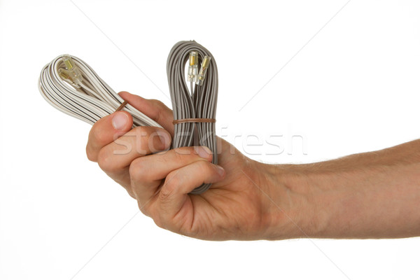 Speaker cable in a hand, isolated Stock photo © michaklootwijk