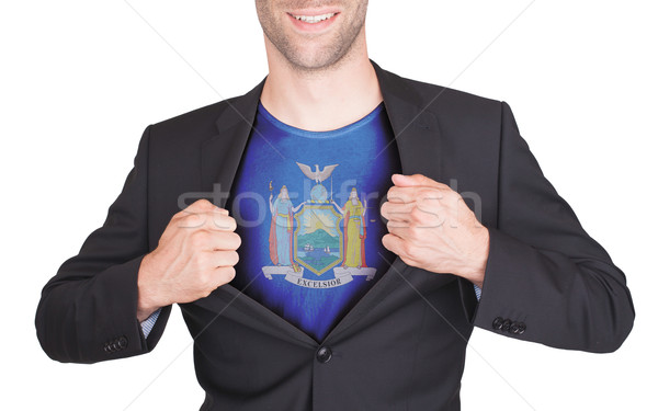 Businessman opening suit to reveal shirt with state flag Stock photo © michaklootwijk