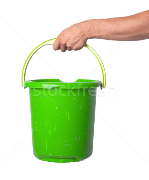 Human hand holding empty plastic pail Stock photo © michaklootwijk