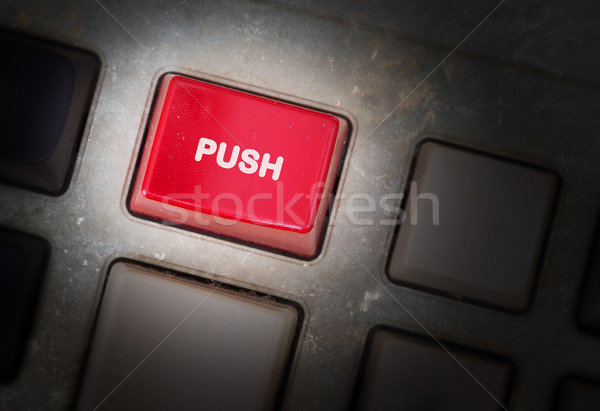 Red button on a dirty old panel Stock photo © michaklootwijk