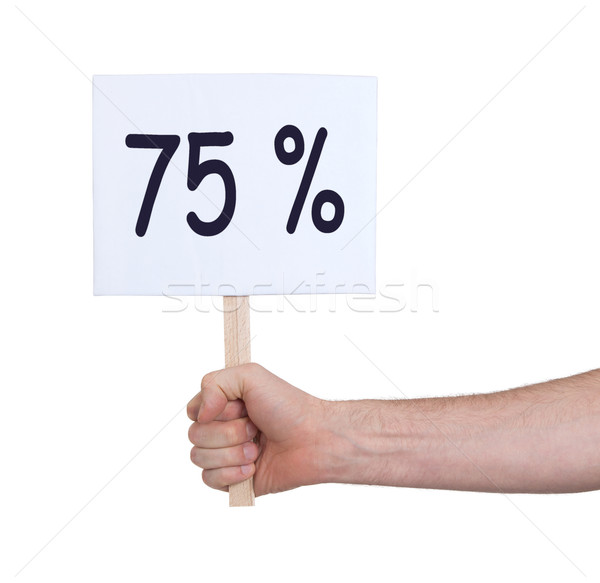 Stock photo: Sale - Hand holding sigh that says 75%