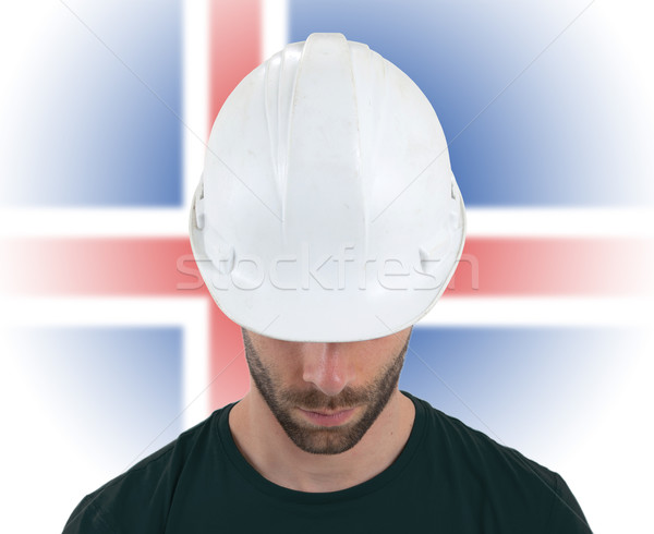 Engineer with flag on background - Iceland Stock photo © michaklootwijk