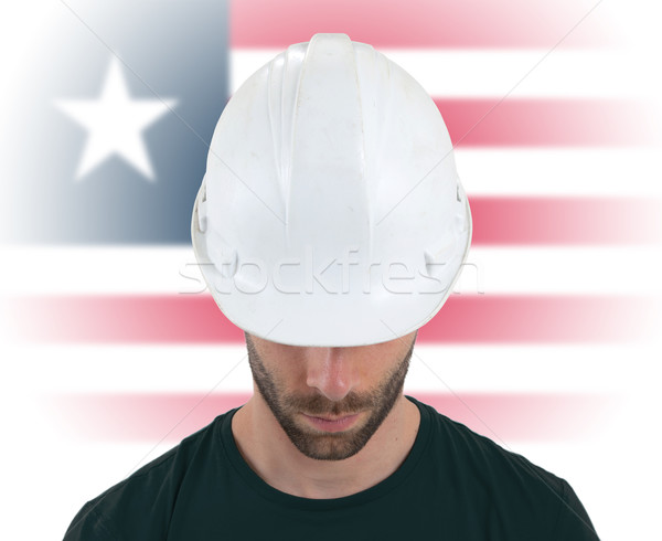 Engineer with flag on background - Liberia Stock photo © michaklootwijk