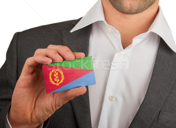 Businessman is holding a business card, Eritrea Stock photo © michaklootwijk