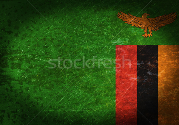 Stock photo: Old rusty metal sign with a flag