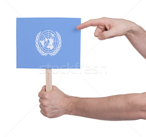 Mão pequeno cartão bandeira onu Foto stock © michaklootwijk