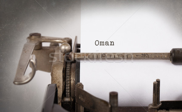 Oude schrijfmachine Oman opschrift vintage land Stockfoto © michaklootwijk