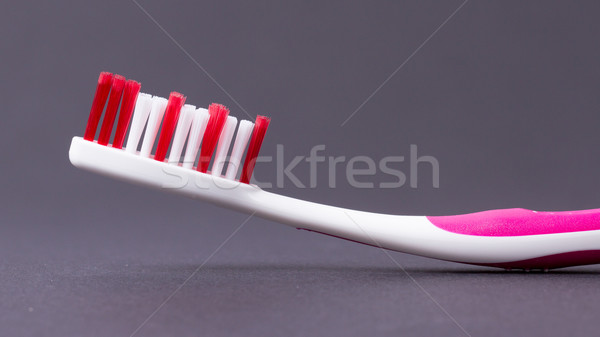 A pink toothbrush Stock photo © michaklootwijk