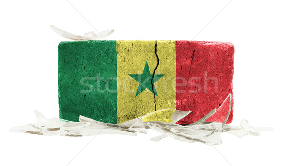 Cegły stłuczone szkło przemocy banderą Senegal ściany Zdjęcia stock © michaklootwijk