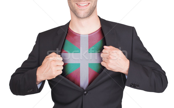 Stock photo: Businessman opening suit to reveal shirt with flag