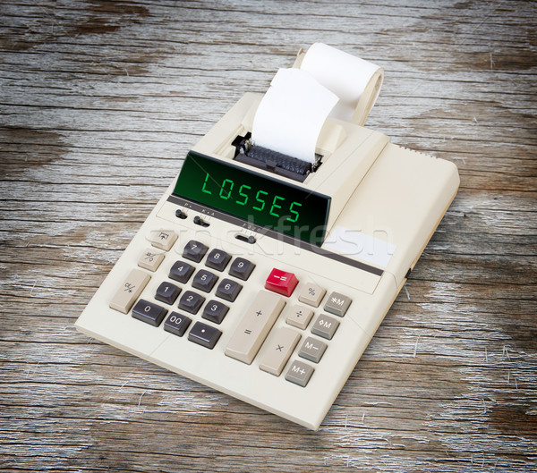 Old calculator - losses Stock photo © michaklootwijk