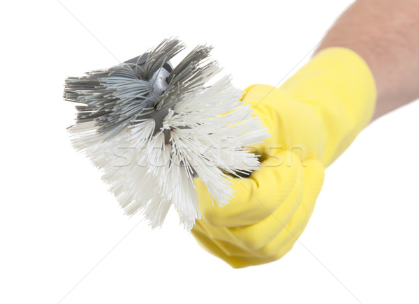 Protection glove holding a dish-brush Stock photo © michaklootwijk