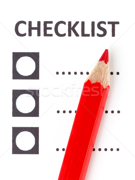 Red pencil on a checklist Stock photo © michaklootwijk