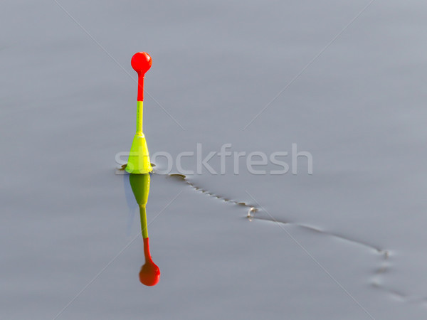 Fishing float floating Stock photo © michaklootwijk